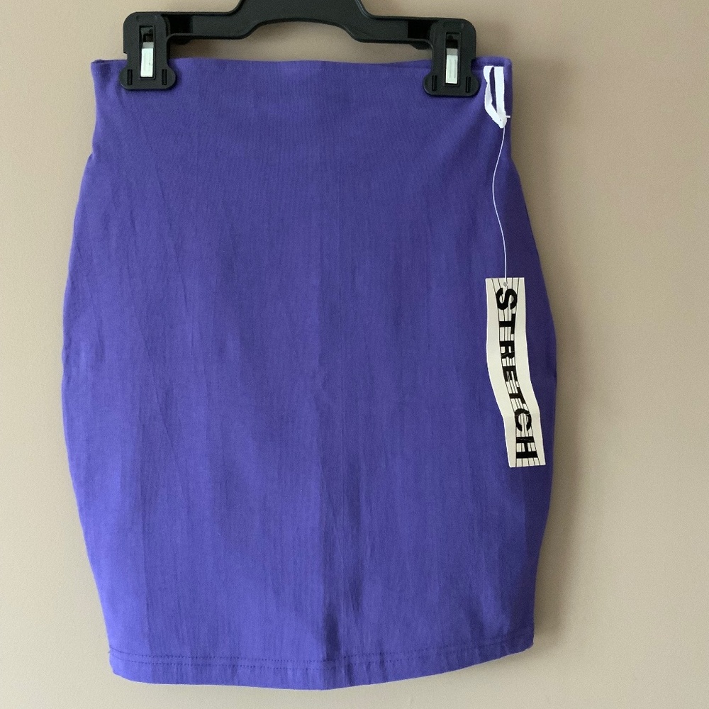 Ladies (new with tags) purple skirt